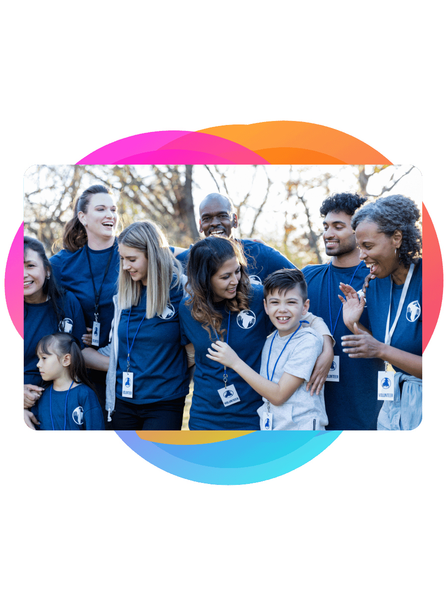 A group of volunteers of different ages in a school - Bee Digital - Education marketing agency